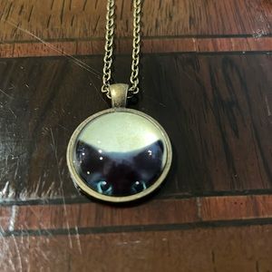 Black Cat Kitten Peering Out of a Pendant Necklace on a Golden Bronze Chain